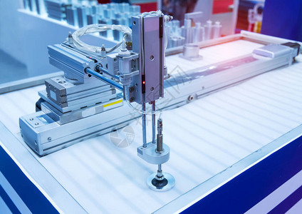 工业机器上的机器人气动活塞吸盘单元背景图片