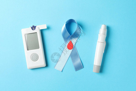 蓝色背景的蓝色认识丝带和糖尿图片