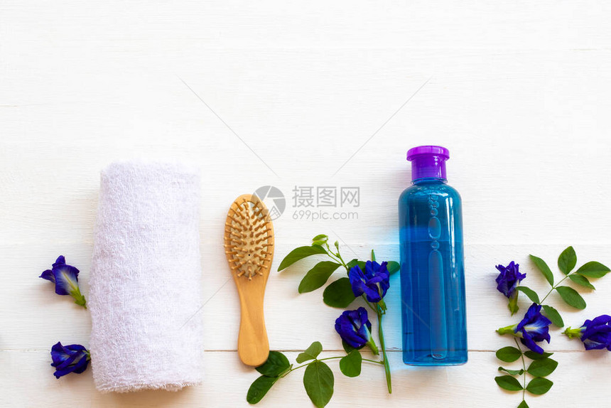 草本洗发水提取物蓝花蝴蝶豌豆保健用刷子梳洗头发图片