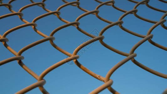 花园铁丝网围栏的背景图像图片