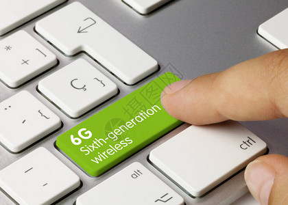 6G六代无线写入于金属键盘的绿键背景图片