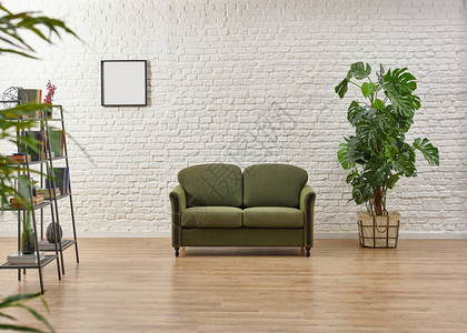 白色砖墙绿色手椅内背景图片