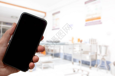 医疗背景模糊的智能手机空白屏幕图片