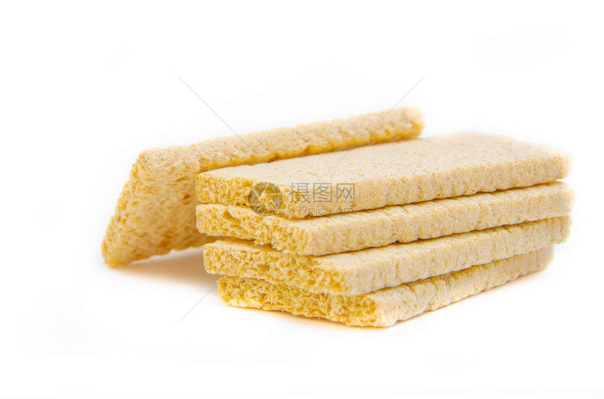 面包适合糖尿病患者的脆饼无糖面包膳食面包卷在白色背景上面包卷被堆积图片