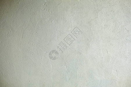 白色未加工的混凝土墙背景右侧漏光图片