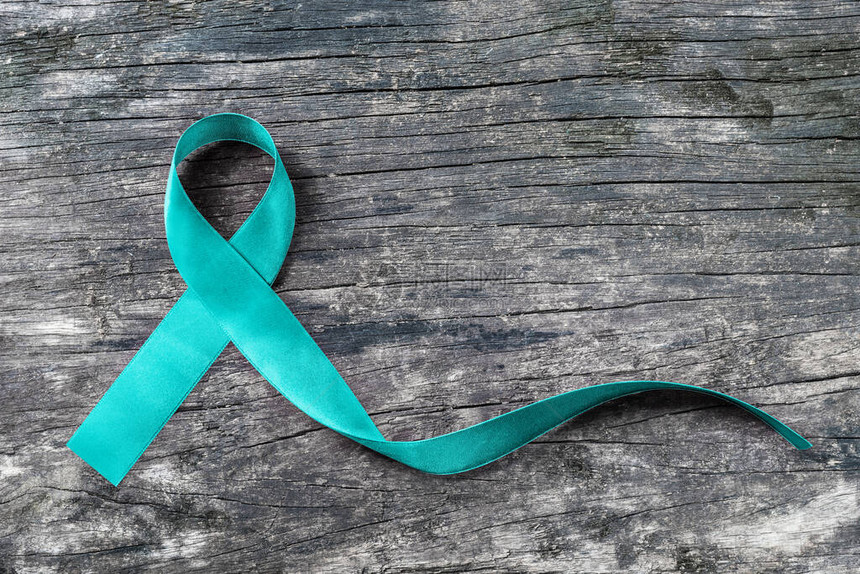 对卵巢癌多囊卵巢综合征PCOS疾病创伤后应激障碍PTSD强迫症OCD的蓝绿色丝带意识图片