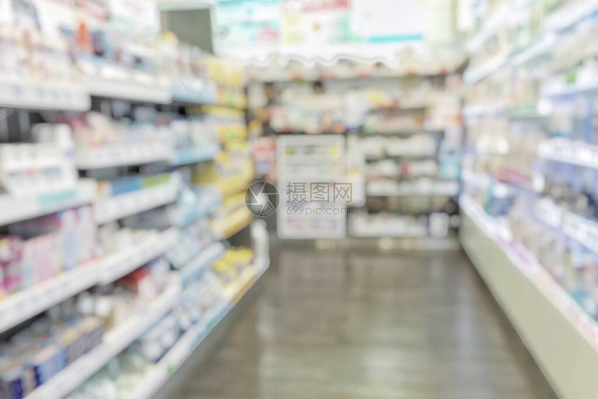 药店或药店模糊的背景与药架和模糊的药品化妆品和药品供应在零售店图片