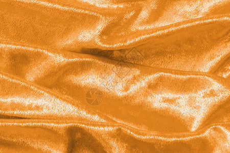 铜金丝绒背景或金黄色丝绒法兰绒质地图片