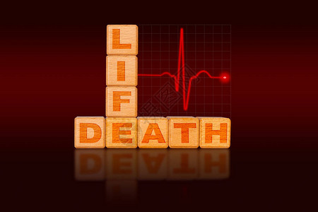 生与死概念以图表的形式写在字母块上背景图片