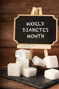 世界糖尿病月在带有糖立方体的图片