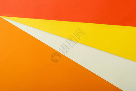 白红黄色和橙色亮纸的背景图片