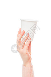 手持塑料杯的酸奶放图片