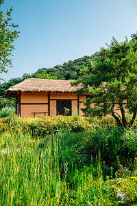 芈月传在韩国仁川Wolmi公园传统园区有绿林的韩国传背景