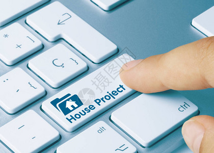 房子项目写在金属键盘的蓝键图片