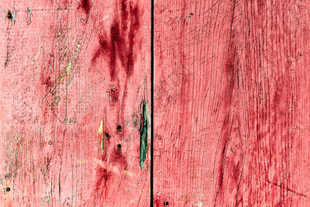 涂漆红色的旧木板墙纹图片