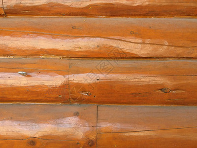 a清漆的木头小屋墙壁图片