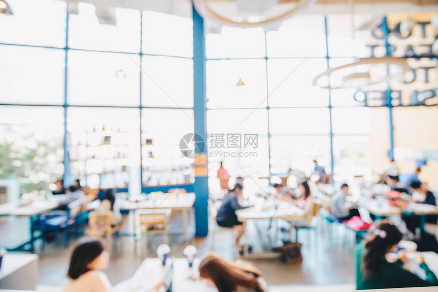 在咖啡店商业背景中模糊的人共办公空图片