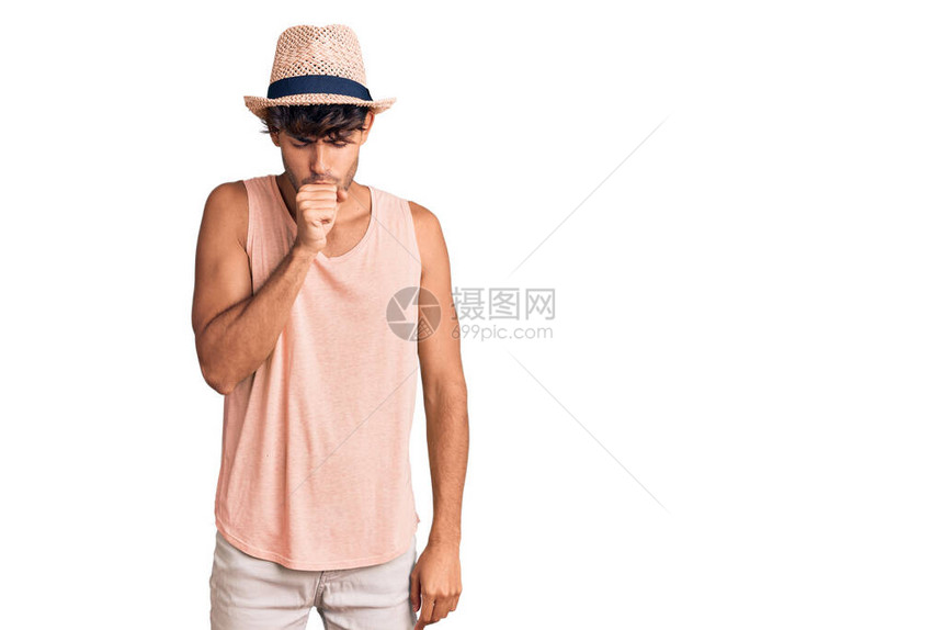 身戴暑期帽子感到不舒服和咳嗽的年青西班牙男子感冒或图片