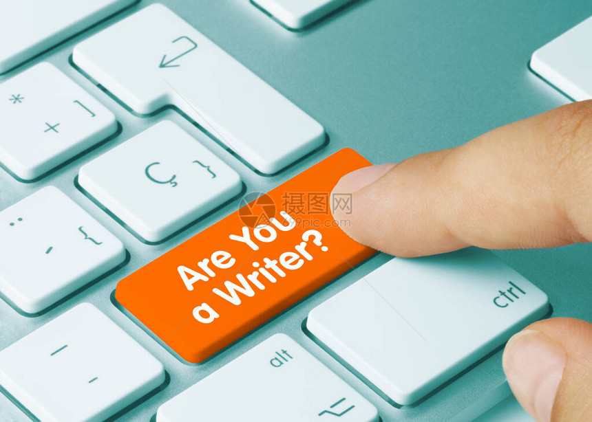 你是作家吗写在金属键盘的橙色键图片