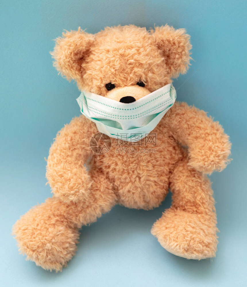儿童冠状和污染pm25保护概念Teddy熊在粉红背景模板横幅图片