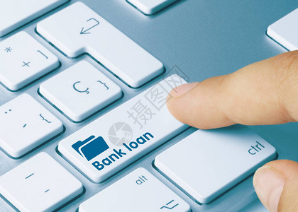 银行贷款已写入金属键盘的蓝键图片