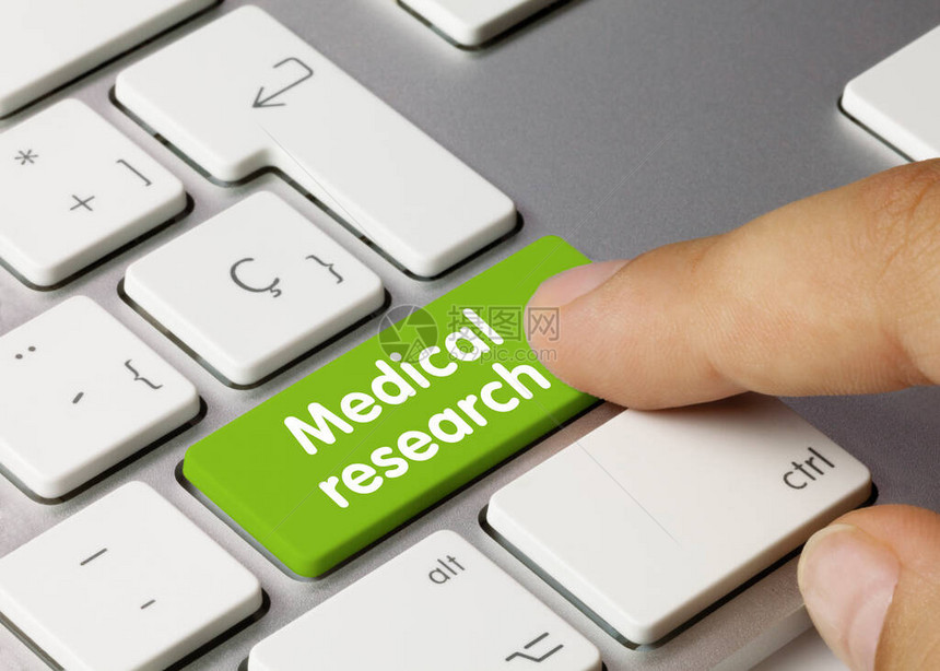 医学研究写在金属键盘绿键上图片