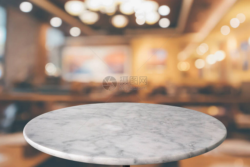 大理石圆桌顶端有咖啡馆bokeh图片