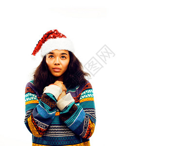 穿着红色圣诞红帽的年轻非洲女孩图片