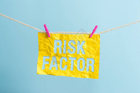文字书写文本风险因素商业照片展示可能增加患病率的特征晾衣绳夹矩形纸图片