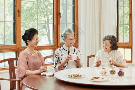 老人下午茶老年人聚会一起品尝下午茶背景