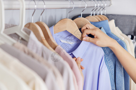 衣橱衣服收纳师整理衣橱特写背景