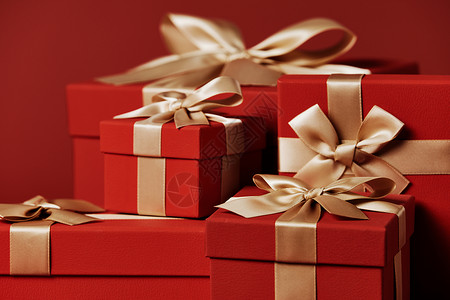 圣诞礼品盒红色礼物盒蝴蝶结特写背景
