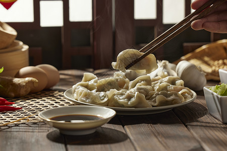 一锅水饺筷子夹起刚出锅的水饺特写背景