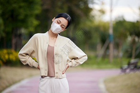 腰部不舒服的女性背景图片