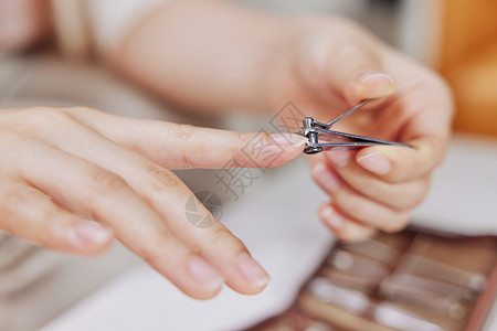 指甲搓使用工具修剪指甲特写背景