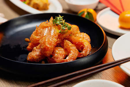 年夜饭油焖大虾年夜饭餐桌上的大虾背景