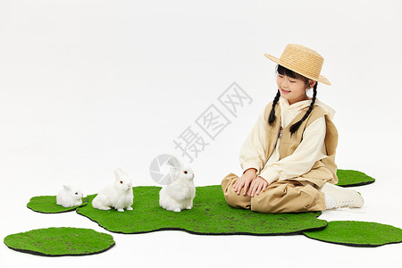 悠闲兔子可爱小女孩与小兔子玩耍背景