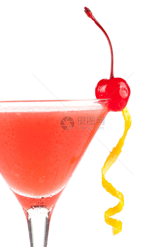 酒精鸡尾酒与橙汁和石榴糖浆与樱桃和柠檬隔图片