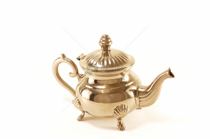 古色香的银茶壶在白色背景下被隔离图片