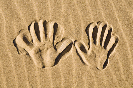 手印在沙子里宏图片