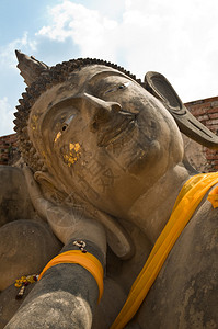 卧佛的脸大城府是泰国大城府的首府它的历史公园是联合国教科文组图片