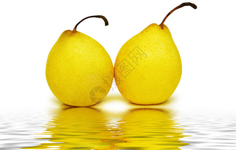 两个黄色的梨子在图片