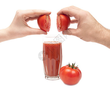 半个西红柿在白色上结合了男和女手图片