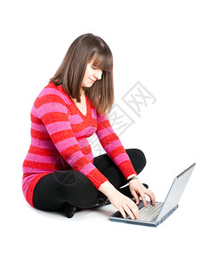 孕妇在笔记本电脑后面工作背景图片