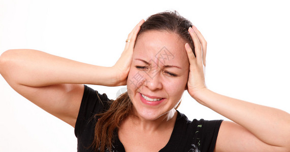 头疼的女人脸上带着痛苦的表情图片