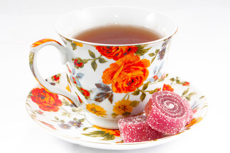 红色和橙色花朵的经典茶杯图片