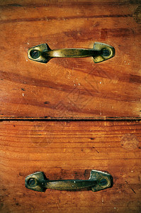 古代木抽屉的特写背景图片