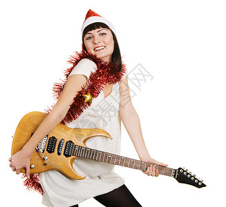 带着电吉他的快乐圣诞女孩图片