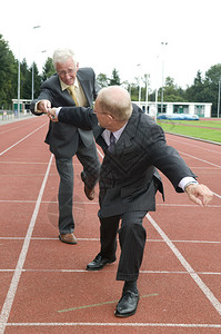 两名商人在一次跑步中作为图片