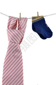 蓝色的婴儿袜子和粉红色领带挂图片